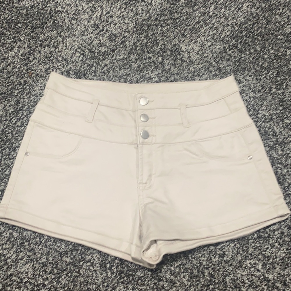 High-waisted light cream colored shorts